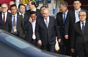 Putin visits Beijing