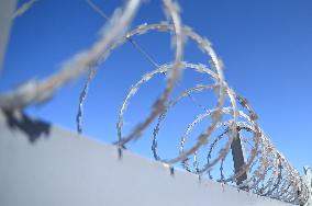 Barbed Wire Protects Medical Clinic Building