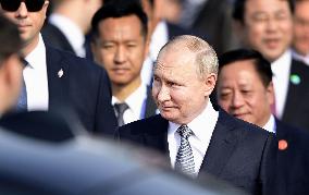 Putin visits Beijing