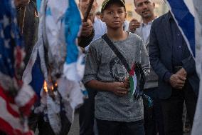 Iran, Burning U.S. And Israel Flags In An Anti-Israel Rally In Tehran