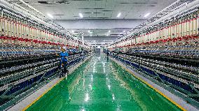 Worker Works in A Spinning Workshop in Bazhou