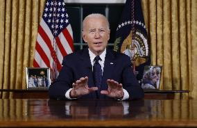 U.S. President Joe Biden delivers an address to the nation from the Oval Office of the White House in Washington