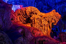 Tourists Travel The Reed Flute Cave Scenic Spot in Guilin