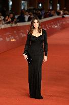 Monica Bellucci And Tim Burton Walk The Red Carpet - Rome