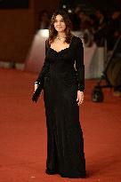 Monica Bellucci And Tim Burton Walk The Red Carpet - Rome