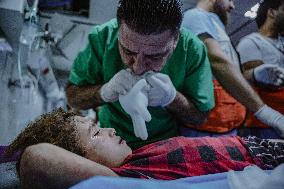 Dead And Wounded Strain Hospitals - Gaza