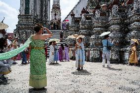 Tourists Visit The Temple Of Dawn.