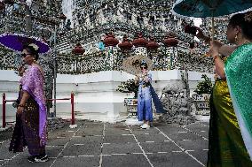 Tourists Visit The Temple Of Dawn.