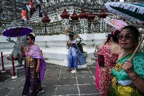 Tourists Visit The Temple Of Dawn.