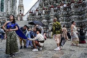 Tourists Visit The Temple Of Dawn.