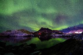 The Northern Lights Appear In The Sky Over Svolvaer
