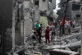 Destruction in Nuseirat Camp After Israeli Strikes Amid Ongoing Conflict