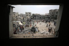 Destruction in Nuseirat Camp After Israeli Strikes Amid Ongoing Conflict