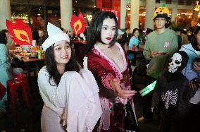 Tourists Attend A Halloween Parade in Shanghai