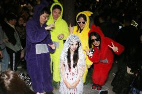 Tourists Attend A Halloween Parade in Shanghai