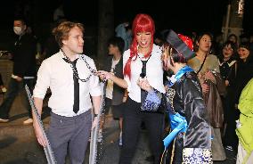 Tourists Attend A Halloween Parade in Shanghai