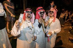 People in Various Halloween-themed Costumes Play in Shanghai