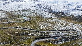 A Winding Mountain Road in Ganzi