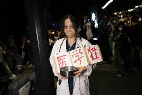 People in Various Halloween-themed Costumes Play in Shanghai