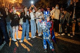 People in Various Halloween-themed Costumes Play in Shanghai