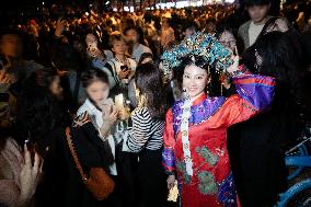 People in Various Halloween-themed Costumes Play in Shanghai