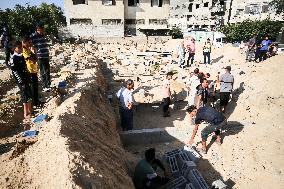 Grieving Palestinians at Al Aqsa Martyrs Hospital in Deir al-Balah Following Israeli Strikes