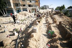 Grieving Palestinians at Al Aqsa Martyrs Hospital in Deir al-Balah Following Israeli Strikes