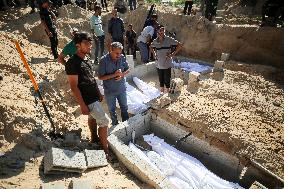 Grieving Palestinians at Al Aqsa Martyrs Hospital in Deir al-Balah Following Israeli Strikes