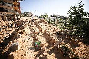 Grieving Palestinians at Al Aqsa Martyrs Hospital in Deir al-Balah Following Israeli Strikes