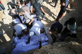 Grieving Palestinians at Al Aqsa Martyrs Hospital in Deir al-Balah Following Israeli Strikes