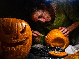 Carving Pumpkins For Halloween Night.