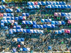 Rows of Umbrellas and Stalls at A Market in Lianyungang