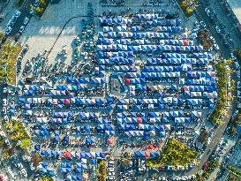 Rows of Umbrellas and Stalls at A Market in Lianyungang