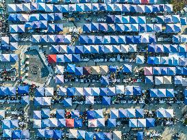Rows of Umbrellas and Stalls at A Market in Lianyungang