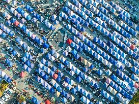 Rows of Umbrellas and Stalls at A Market in Lianyungang