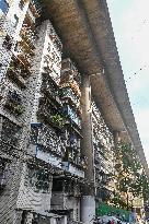 The Residential Building Under A Bridge in Guiyang