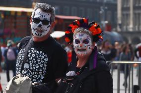 People Dress Up For The Day Of The Dead