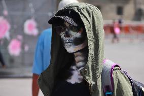People Dress Up For The Day Of The Dead