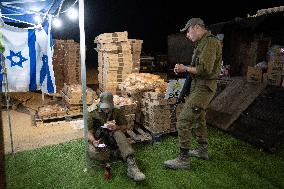 Israeli Soldiers Rest At A Camp Made by Volunteers