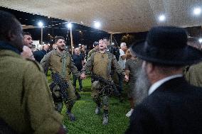 Israeli Soldiers Rest At A Camp Made by Volunteers