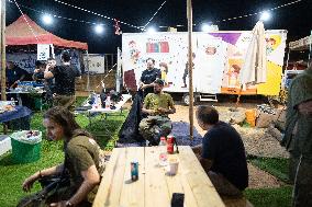 Israeli Soldiers Rest At A Camp Made by Volunteers