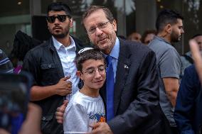 President Herzog Visits Evacuees In Jerusalem
