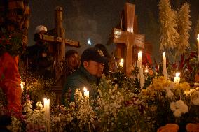 People Attend The Mixquic Cemetery To Celebrate The Day Of The Dead