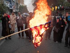 Iran-Burning U.S. And Israeli Flags And Effigy In Anniversary Rally