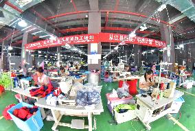 An Embroidery Production Workshop in Qiandongnan