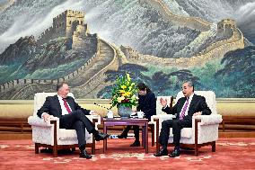 CHINA-BEIJING-WANG YI-NEW ZEALAND-FORMER PM-MEETING (CN)