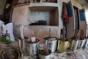 Making of tin can lamps for Ukrainian military in Kyiv Region