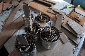 Making of tin can lamps for Ukrainian military in Kyiv Region