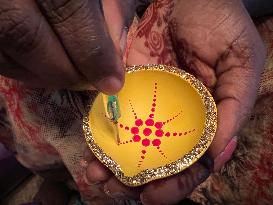 Decorating Clay Diwali Diyas In Preparation For The Diwali Festival