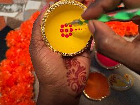 Decorating Clay Diwali Diyas In Preparation For The Diwali Festival